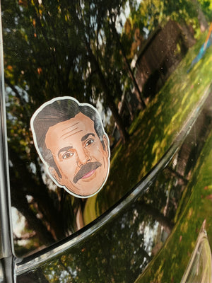 A waterproof Ted Lasso sticker affixed to the back of the artist's ex-husband's old car. He got a lot of compliments on it.